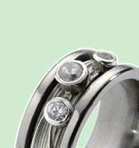 Absolute Titanium Design - Titanium and diamond rings - Gala