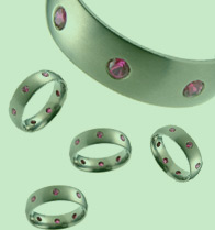 Absolute Titanium Design - Titanium and diamond rings - Oriel with Gems